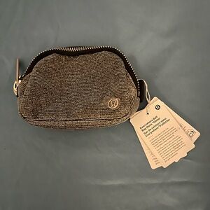 Lululemon athletica Small Glitter Zip Pouch belt bag in Silver/Black